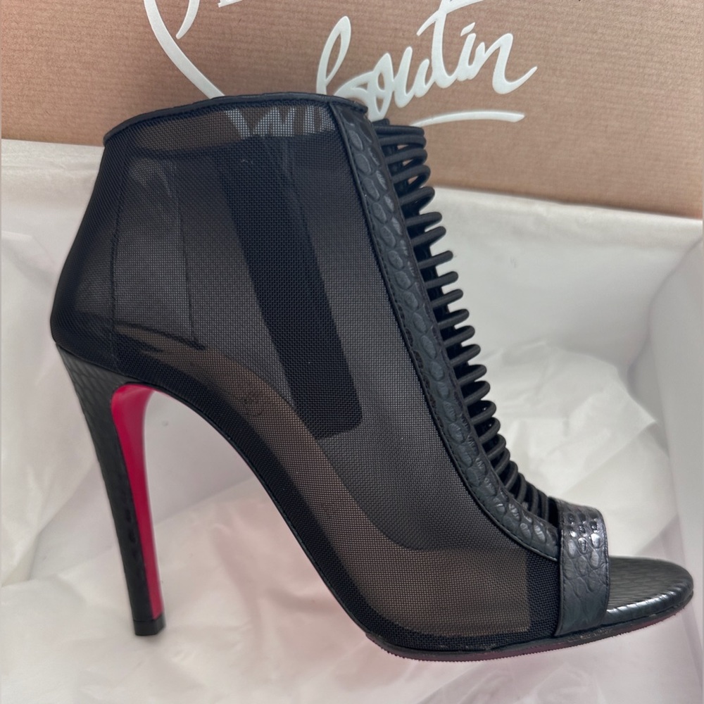 CHRISTIAN LOUBOUTIN
Calf Jurassic Rete Trouble 100 Booties size 38